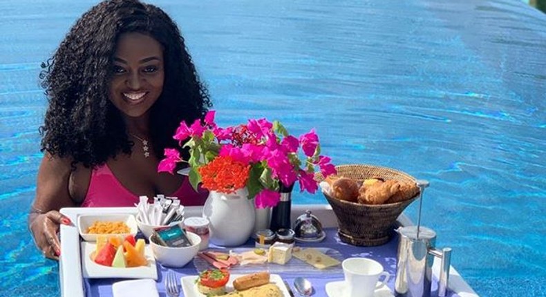 Ghanaian actress, Jackie Appiah enjoys her breakfast  in the Pool