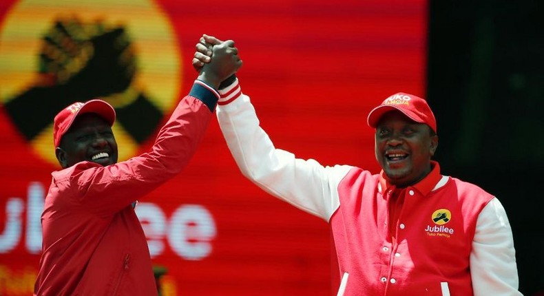 President Uhuru Kenyatta and Deputy President William Ruto during the launch of the Jubilee Party at Safaricom Stadium in Nairobi on Septermber 10, 2016.