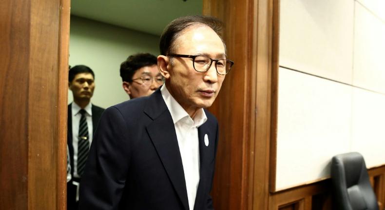 The spy chief's efforts had been in favour of then South Korean president Lee Myung-Bak (pictured at his trial in 2018)