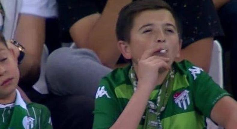 ‘Little boy’ captured smoking at a football stadium turns out to be a 36-year-old man (video)