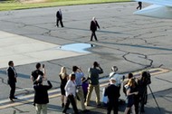 President Donald Trump boards Air Force One at Morristown municipal airport in New Jersey