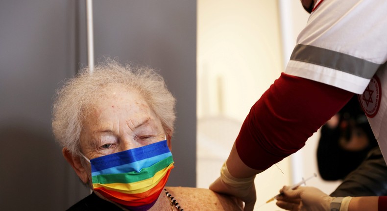 A woman receives a COVID-19 booster shot Neta nya, Israel, January 19, 2021.
