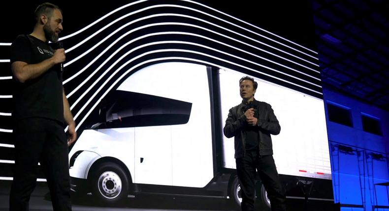 Tesla Chief Executive Elon Musk (right) speaks with Dan Priestly, Senior Manager of Tesla Semi Truck Engineering at the vehicles delivery event on December 1, 2022.Tesla/Reuters