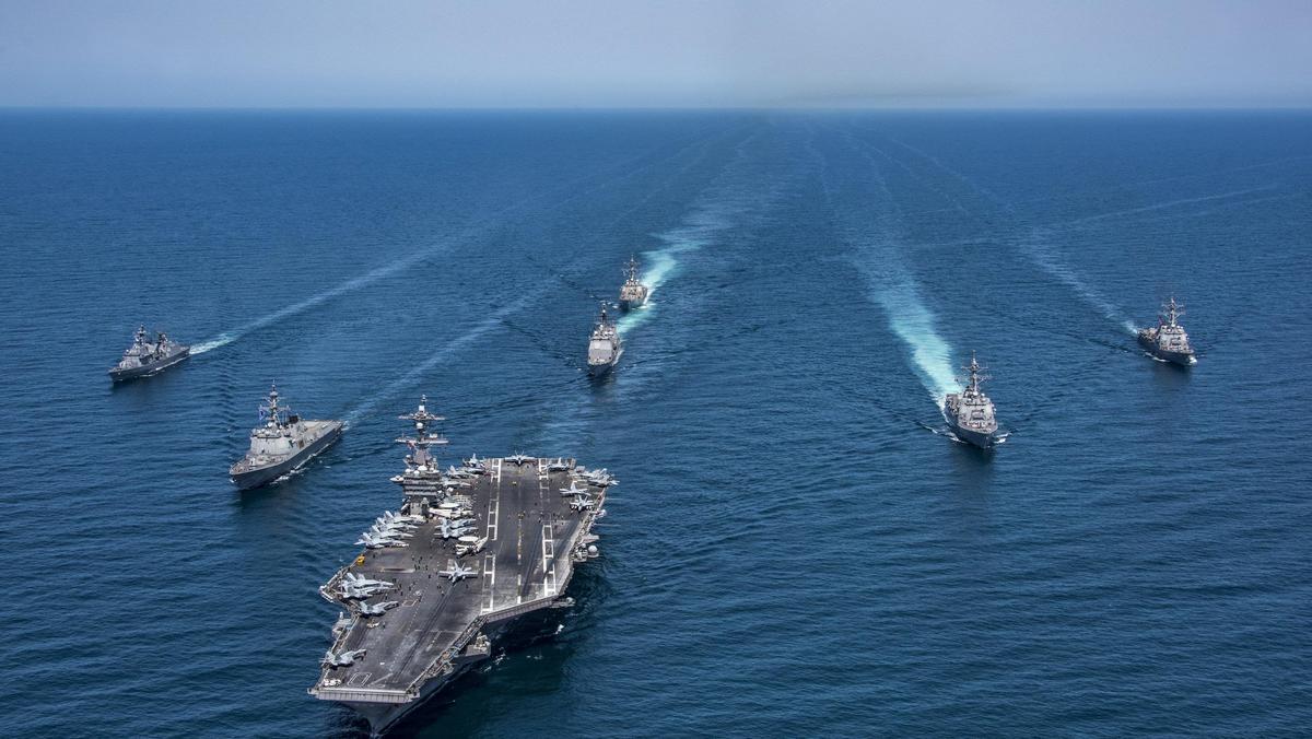 Korean and US destroyers carriers cruisers transit the western Pacific