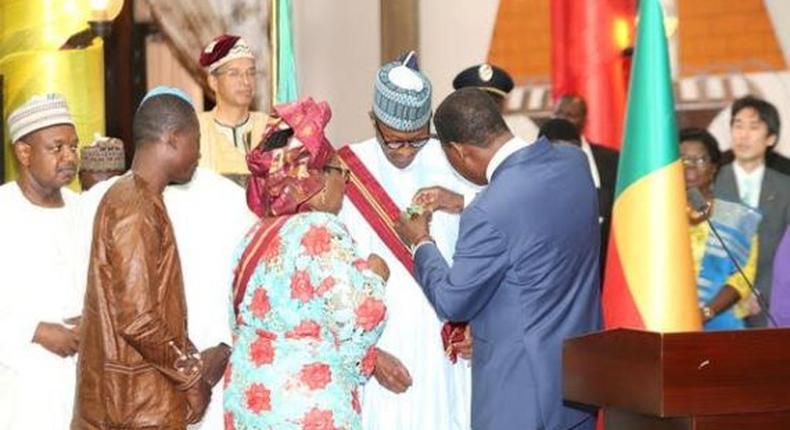 President Muhammadu Buhari receives the Grande Croix Du Benin (The Great Cross of Benin) on August 1, 2015.