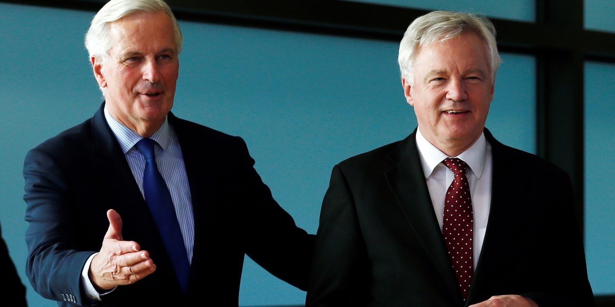 Brexit Secretary David Davis (R) with the EU's chief Brexit negotiator Michel Barnier