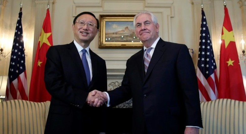 US Secretary of State Rex Tillerson (R) shakes hands with Chinese State Councilor Yang Jiechi before their meeting at the State Department in Washington,DC on February 28, 2017