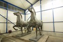 A police handout shows two recovered bronze sculptures made for Adolf Hitler's imposing Reich Chancellery that have been missing for years and are now stored in a police compound in the western German town of Bad Bergzabern