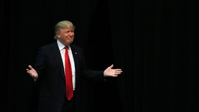 U.S. Republican presidential candidate Trump reacts as he is introduced during a campaign event in C