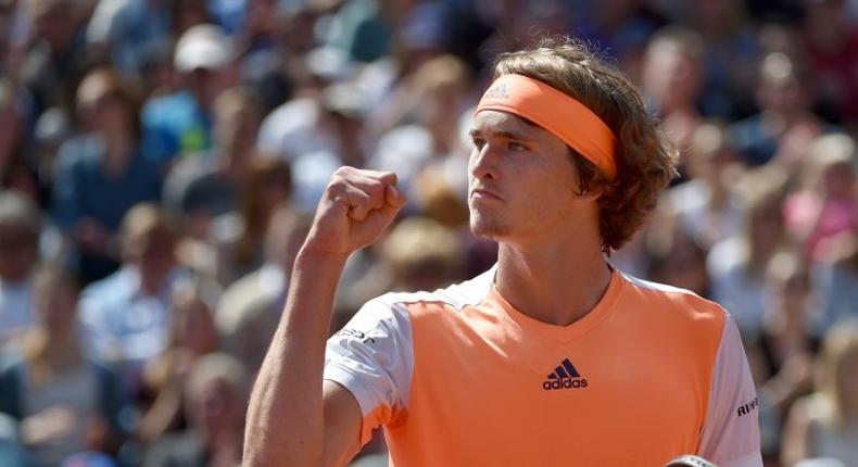 Germany's Alexander Zverev celebrates after winning his semi-finals match against Spain's Bautista Agut at Munich's ATP clay-court tournament on May 6, 2017