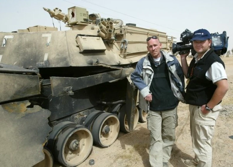 178448_sudbineirak--pored-unistenog-americkog-tenka