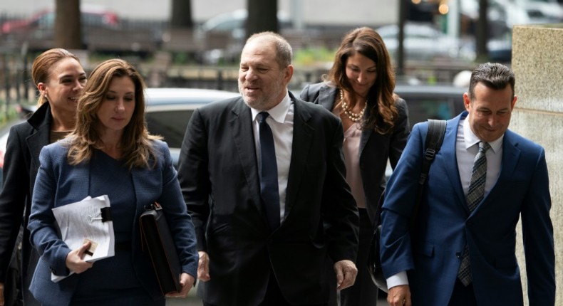 Disgraced movie producer Harvey Weinstein (C) -- seen at his last court appearance on April 26, 2019 -- is due to go on trial for sex assault in September 2019