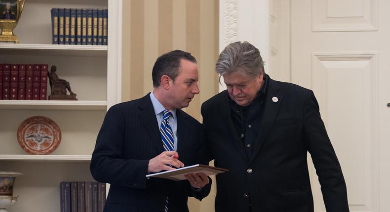 The White House chief of staff, Reince Priebus, and chief strategist, Steve Bannon, in the Oval Office on January 28.