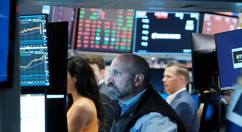 Traders work on the floor of the New York Stock Exchange.Spencer Platt/Getty