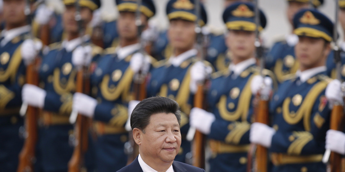 China's President Xi Jinping inspects honour guards during a welcoming ceremony outside the Great Hall of the People in Beijing, China.