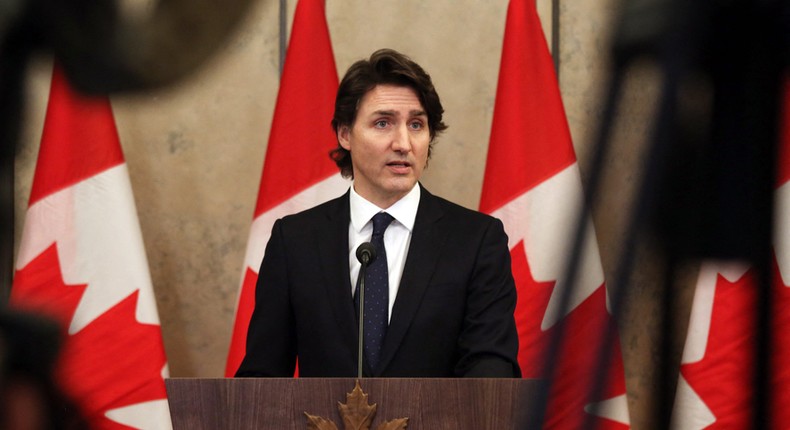 Canada's Prime Minister Justin Trudeau speaks with reporters during a news conference on Parliament Hill February 11, 2022 in Ottawa, Canada.