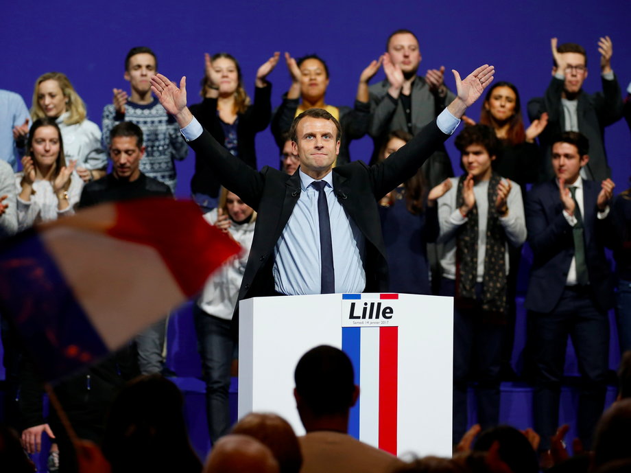 Emmanuel Macron, head of the political movement En Marche !, or Forward !, and candidate for the 2017 French presidential election, sings the French national anthem at the end of a political rally in Lille, France January 14, 2017.