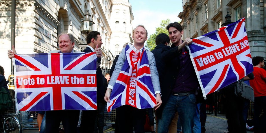 Vote leave supporters wave Union flags, following the result of the EU referendum, outside Downing Street in London, Britain June 24, 2016.