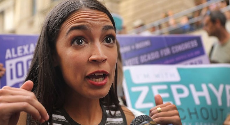 A conservative writer slammed Alexandria Ocasio-Cortez, here in New York in June, for wearing a jacket and coat don't look like a girl who struggles.