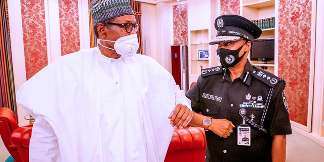 President Muhammadu Buhari (left) with the Inspector-General of Police, Usman Baba Alkali (right) [Presidency]