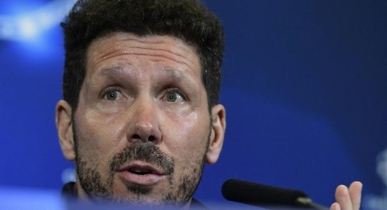 Atletico Madrid's coach Diego Simeone attends a press conference at the Vicente Calderon stadium in Madrid on November 22, 2016