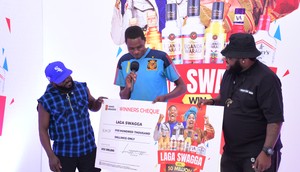 Shafiq Kyewalabye gets a check from Madrat and Chiko