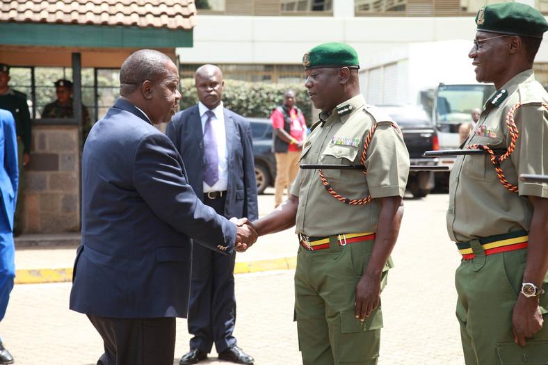 Interior CS Fred Matiang'i with senior prison officers during a past visit 