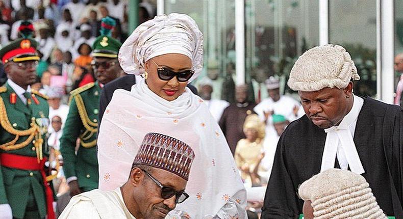 Muhammadu Buhari taking his oath of office on Friday, May 29, in company of his wife and legal luminaries.