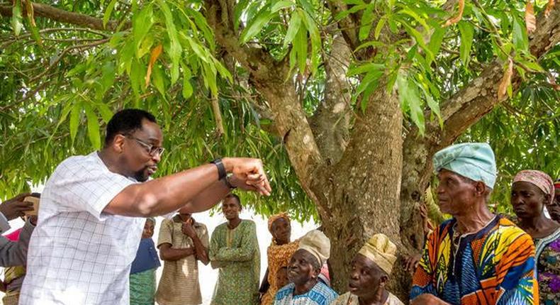 N-Power team interacting with volunteers and some farmers at a farm settlement in Osogbo.