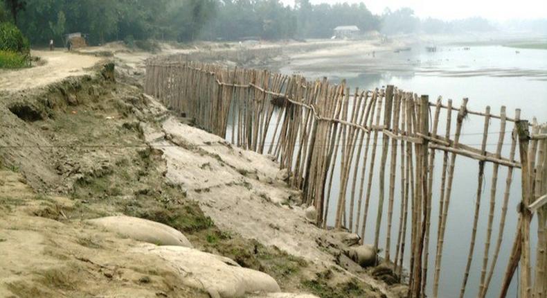 Bangladesh river eats up land and homes, trapping poor villagers