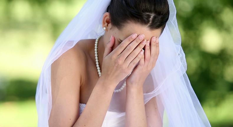 Bride crying on wedding day