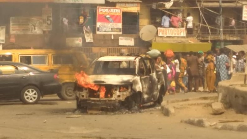 Protesting bike riders set a Lagos govt van on fire on Wednesday, February 5, 2020 (Pulse)