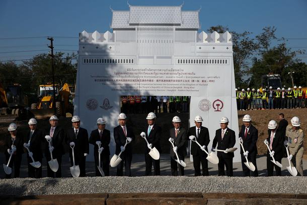 Thailand's PM Chan-ocha and Chinese Government representative Wang take part in train development ce