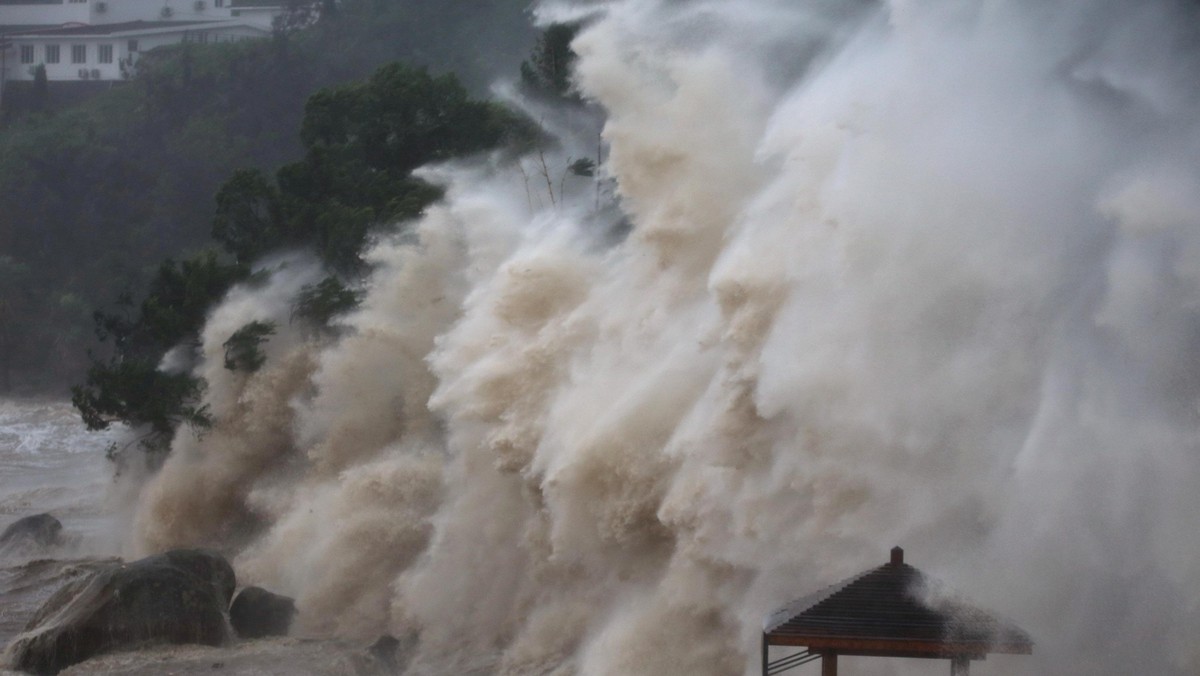 Waves brought by Typhoon Maria lash the shore in Wenzhou