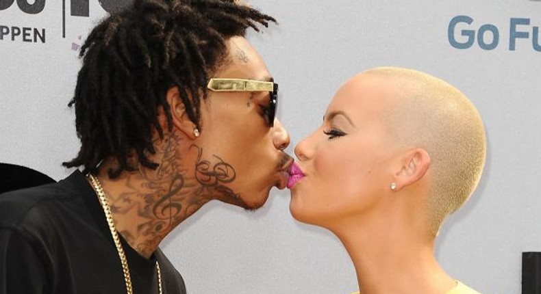 Wiz Khalifa and Amber Rose share a kiss