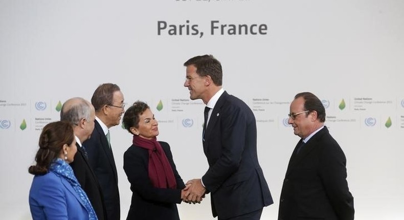 Netherlands Prime Minister Mark Rutte (2nd R) is welcomed by French President Francois Hollande (R) and (L to R) French Ecology Minister Segolene Royal, French Foreign Affairs Minister Laurent Fabius, President-designate of COP21, United Nations Secretary General Ban Ki-moon and Christiana Figueres, Executive Secretary of the UN Framework Convention on Climate Change, as he arrives for the opening day of the World Climate Change Conference 2015 (COP21) at Le Bourget, near Paris, France, November 30, 2015. REUTERS/Christian Hartmann