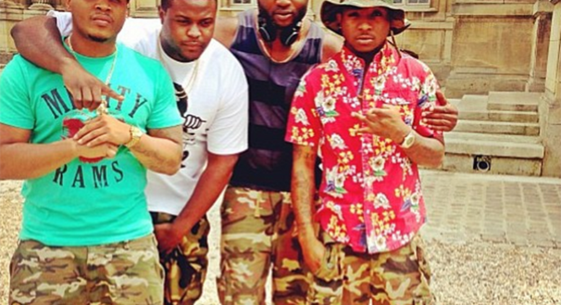 HKN Gang (Sina Rambo, Adewale Adeleke, Kamal (Davido's manager), Davido) all wearing camo shorts