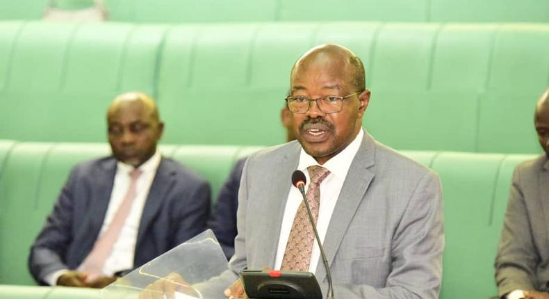 The Minister of State for Planning, Amos Lugoloobi, presents the loan request to Parliament