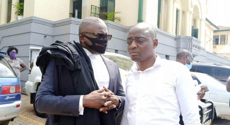 Ham-Kiggundu with his lawyer Fred Muwema