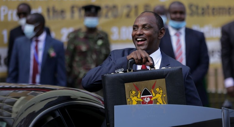 NAIROBI, NAIROBI COUNTY, KENYA - 2020/06/11: Kenyas National Treasury and Planning Cabinet Secretary, Ukur Yatani with the budget briefcase before leaving to Parliament for budget reading 2020/2021. (Photo by Billy Mutai/SOPA Images/LightRocket via Getty Images)