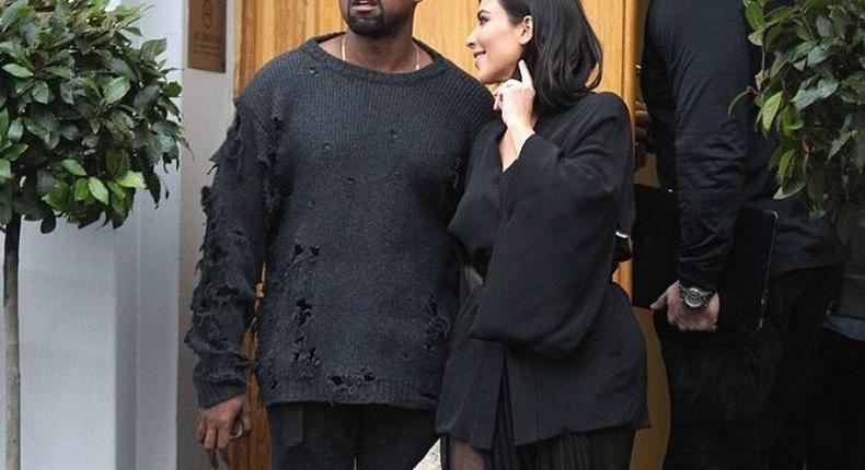 Kanye West in torn Sweater