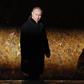 Russian President Putin attends a wreath laying ceremony at the eternal flame during an event to commemorate the 75th anniversary of the battle of Stalingrad in World War Two, at the Mamayev Kurgan memorial complex in Volgograd