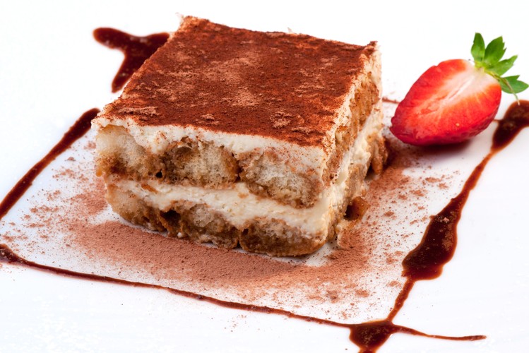 <b>Tiramisu</b><br />Wyśmienity deser, który nikogo nie pozostawia obojętnym: biszkopt, kawa, likier amaretto i mascarpone są pysznym połączeniem