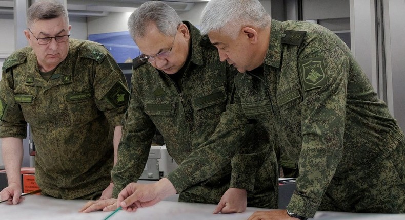 Russian Defence Minister Sergei Shoigu and Colonel General Yevgeny Nikiforov (R), commander of troops of the Western Military District, visit the advanced control post of Russian troops involved in Russia-Ukraine conflict, at an unknown location, in this picture released June 26, 2023.Russian Defence Ministry/Handout via REUTERS