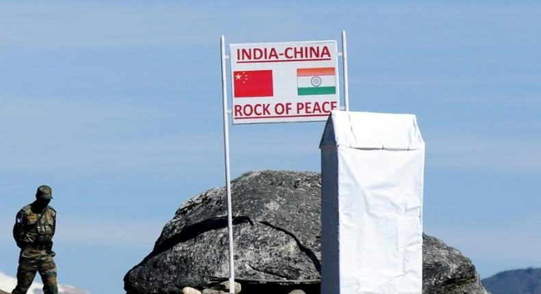 An Indian soldier keeping watch at Bumla Pass on the India-China border in Arunachal Pradesh