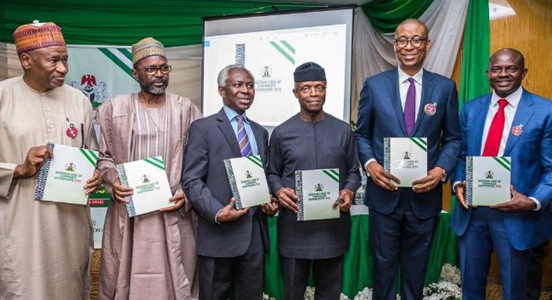 Vice President Yemi Osinbajo (3R)