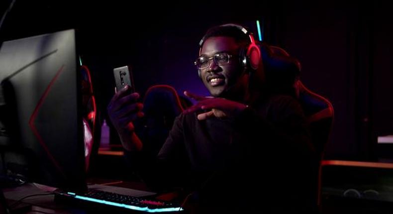 Young man in front of gaming console/Courtesy/Ameyaw Debrah Media