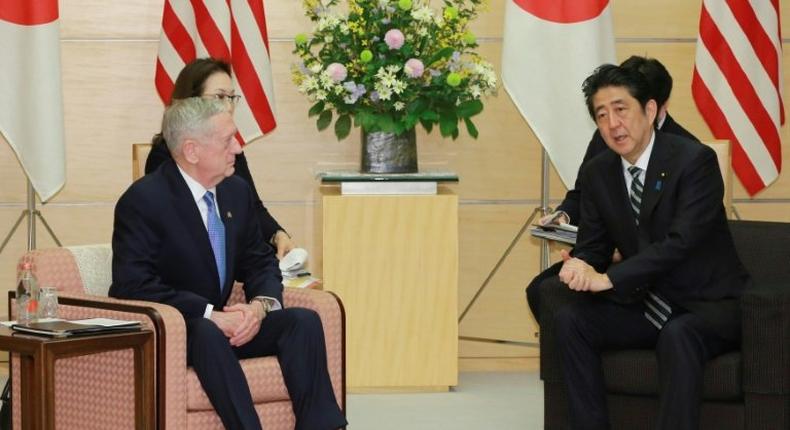 James Mattis (left) meets Shinzo Abe at the prime minister's office in Tokyo on February 3, 2017