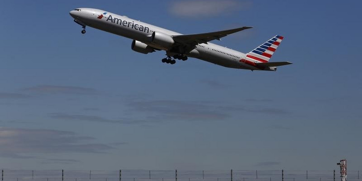An American Airlines airplane takes off from Heathrow Airport in London.