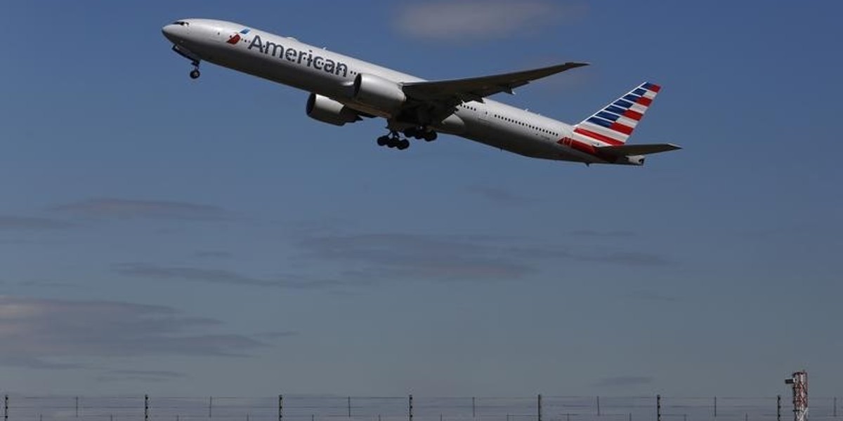 An American Airlines airplane takes off from Heathrow Airport in London.